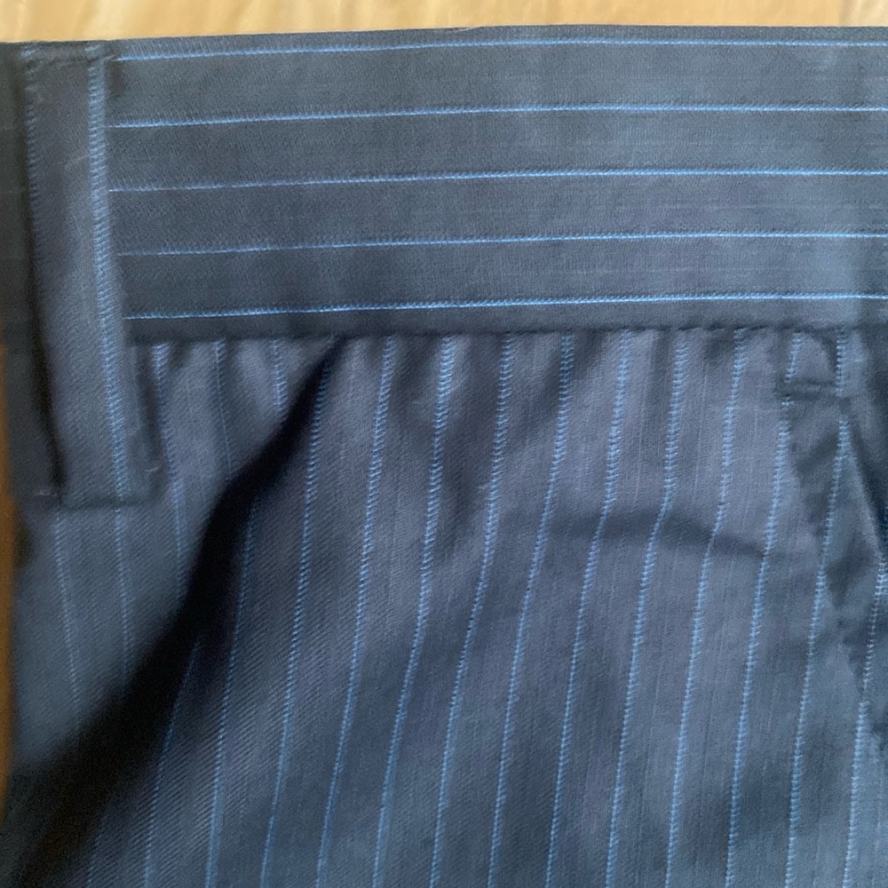 NWT Men’s Calvin Klein Dress Pants with blue pin strips. Waist 34. Length 32